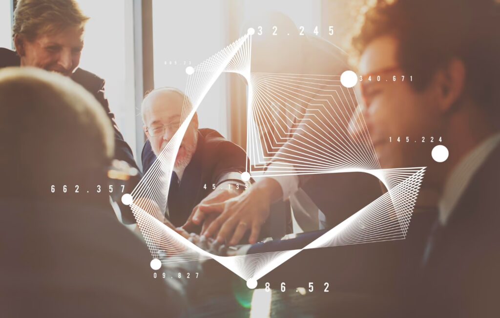 People discussing at work. Image of a graph on top of them.